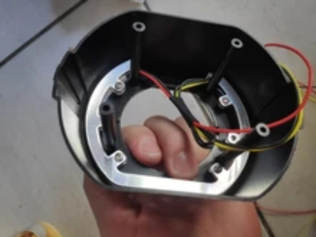 Real inside view of an Angel Eyes projector shroud with wiring