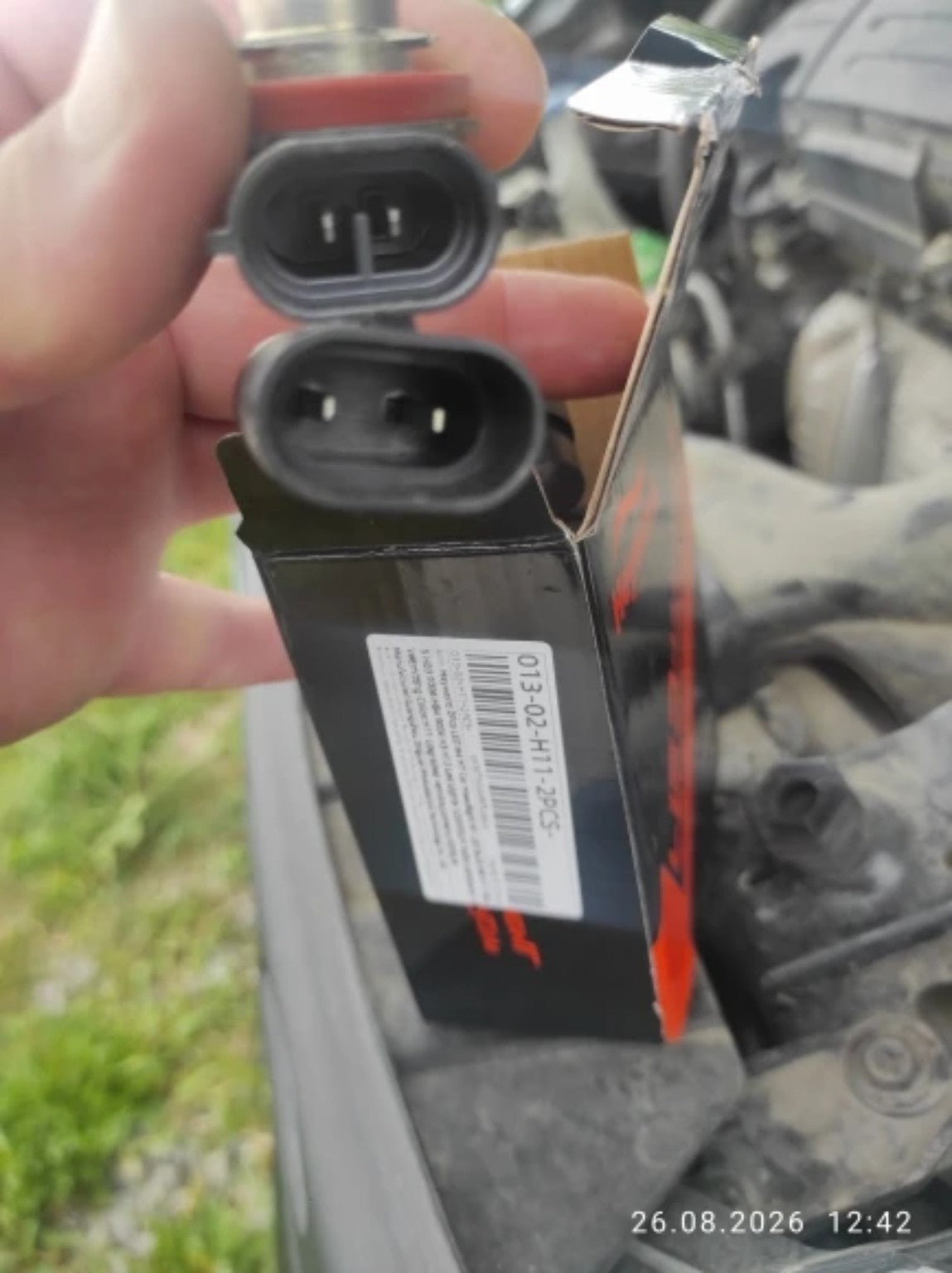RivoMoto LED headlight bulb connector close-up