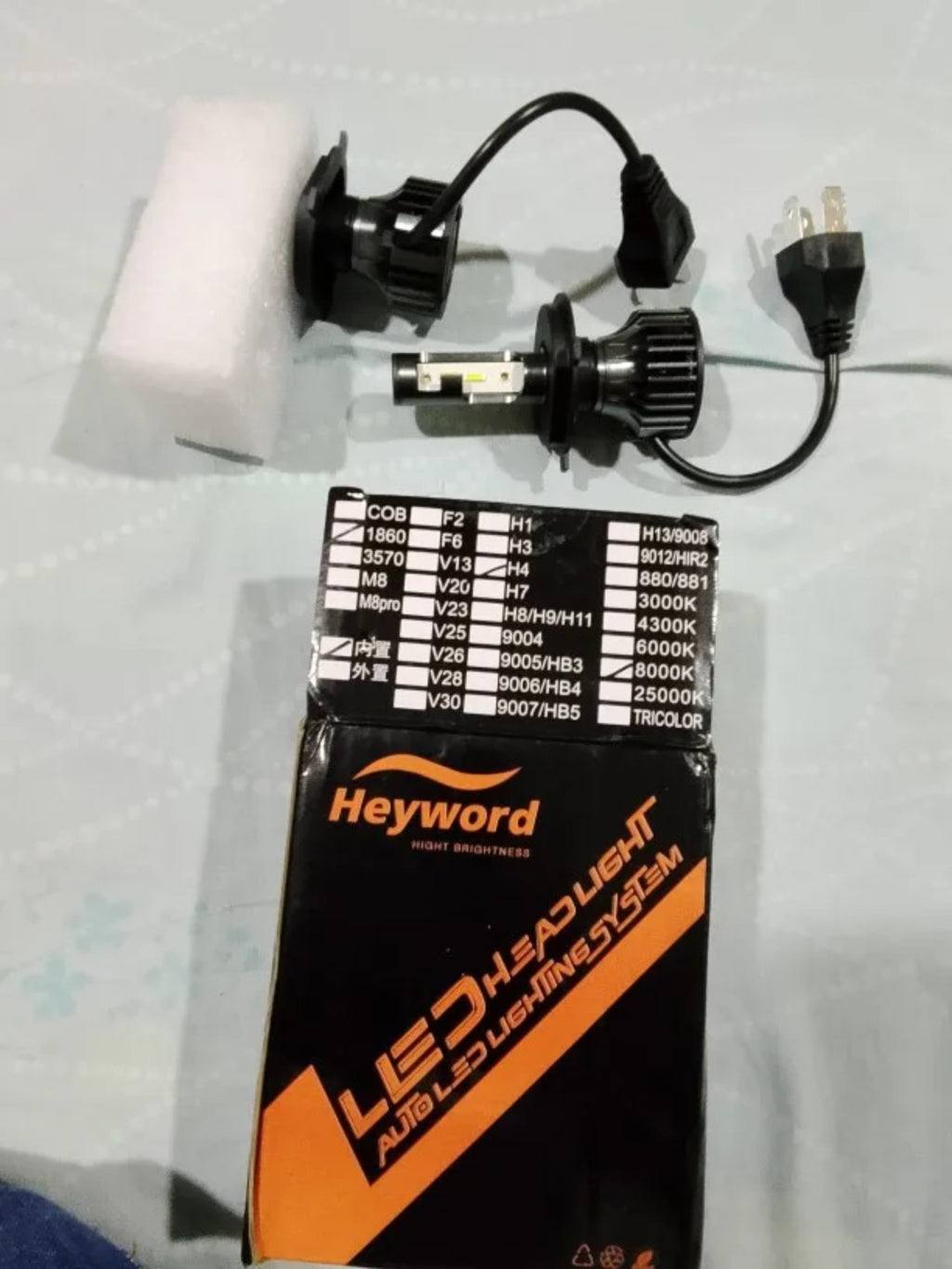 RivoMoto LED headlight bulbs pair with Heyword packaging