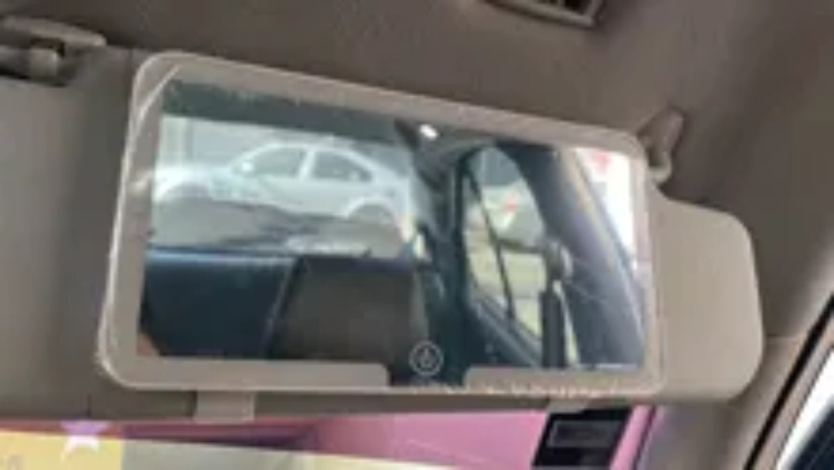 Real RivoMoto visor mirror installed on sun visor