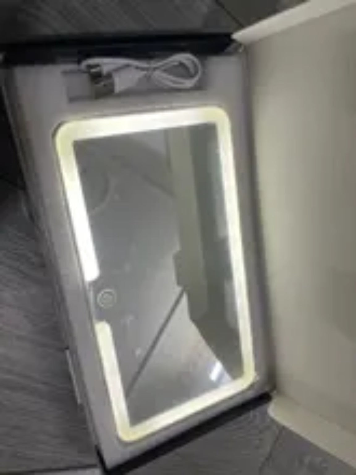 Real RivoMoto visor mirror in package with LED light and charging cable