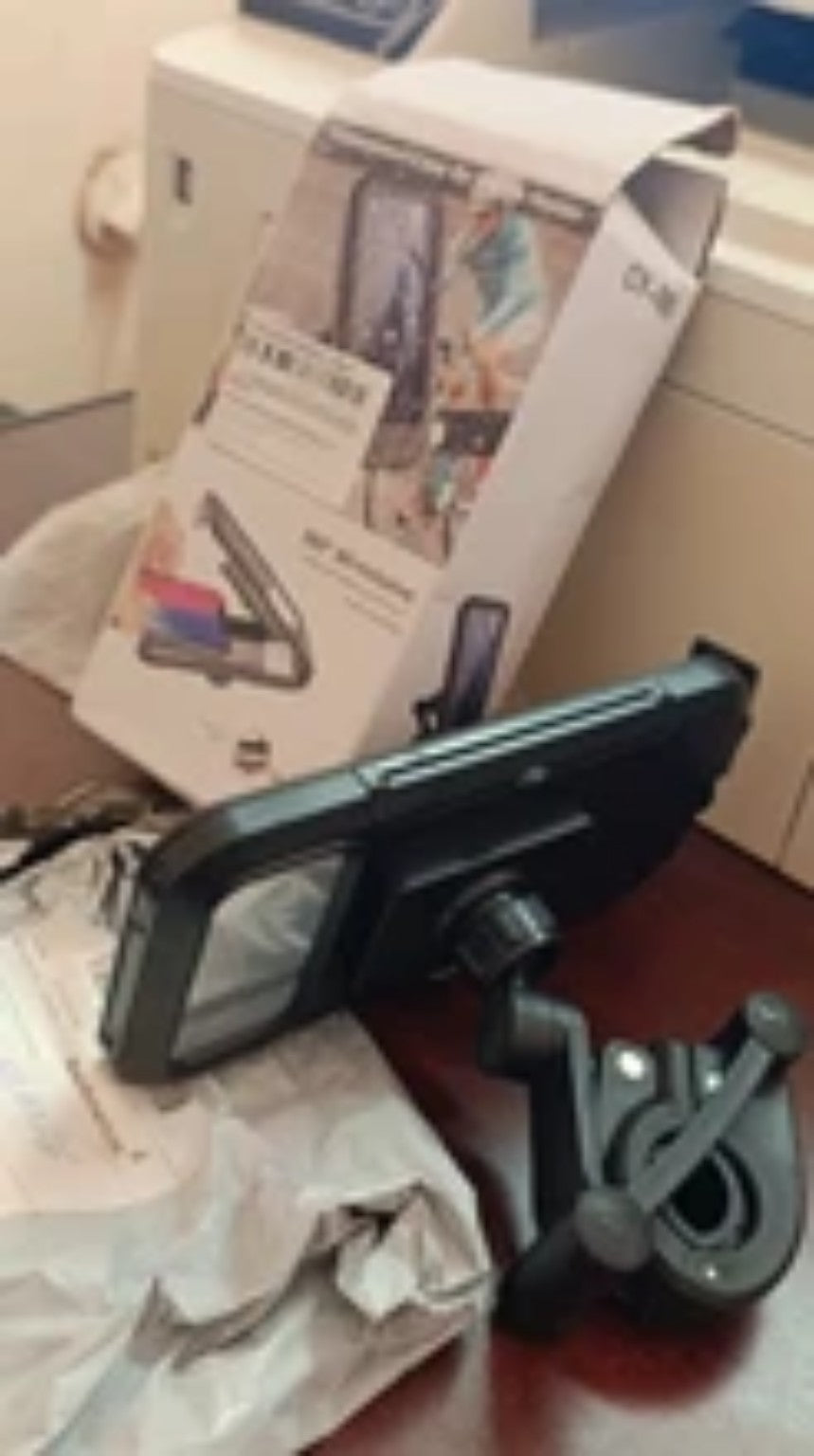 Waterproof motorcycle phone holder shown mounted with included hardware